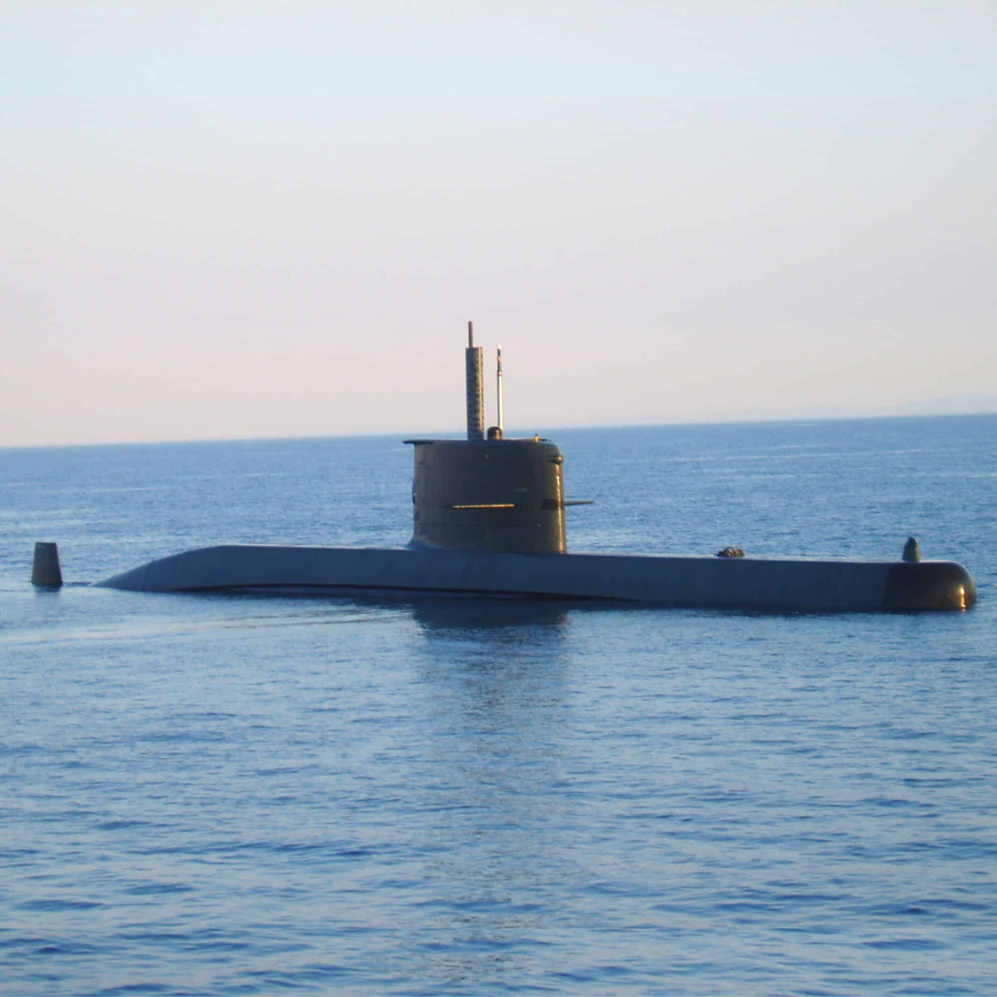 A submarine breaks the surface of the ocean.